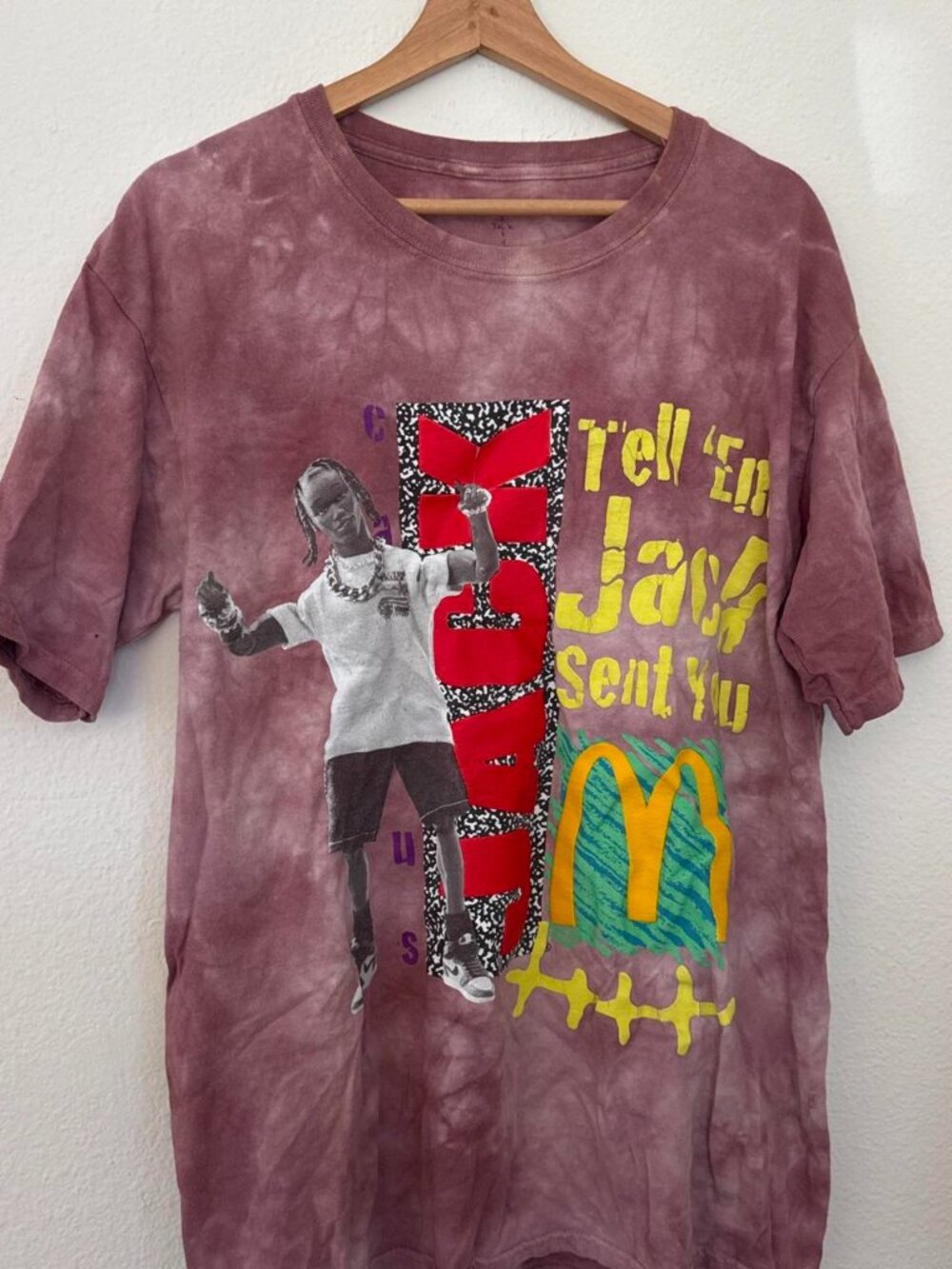 Travis Scott Cactus Jack tie-dye tee with graphic of a person with a McDonald's